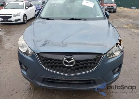 2015 Mazda Cx-5 Grand Touring z USA, uszkodzony, nr VIN JM3KE4DY9F0459531
